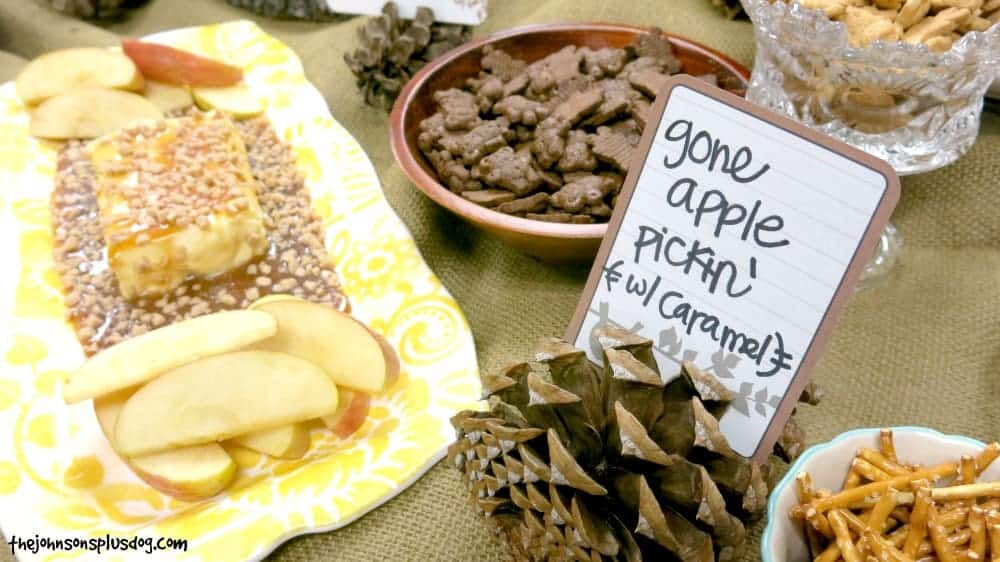 Gone apply pickin, teddy grahams, pretzels and a card standing on a pine cone that says gone apple pickin with caramel