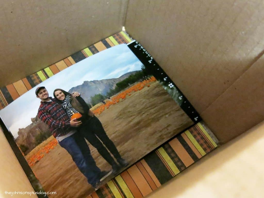 This fall theme pregnancy announcement has a fun picture of Chelsea and Logan in a pumpkin farm