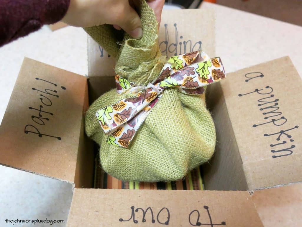 Inside this small box is a little pumpkin wrapped in a cute burlap sack