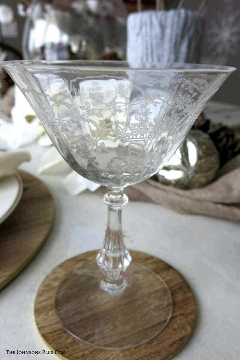 Using vintage glassware in a winter tablescape brings character to the table