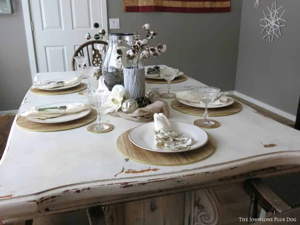 this simple rustic farmhouse style tablescape is perfect for transitioning your dining room from fall to winter