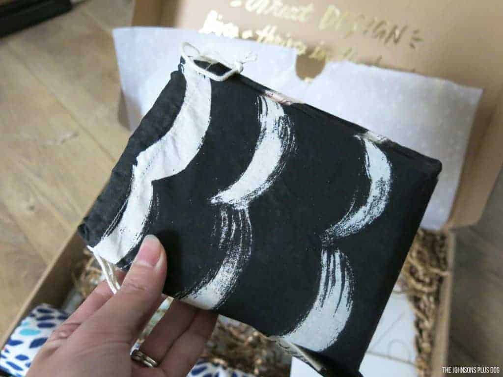 A black and white fabric pouch I received in my Minted More membership welcome box.