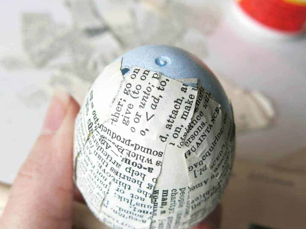 Using mod podge to upcycle plastic Easter eggs into stylish vintage decor.