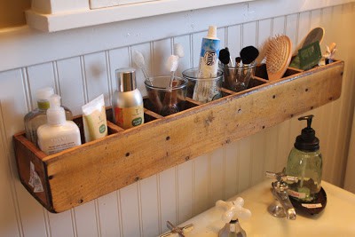 Flip a reclaimed wooden box and install it to the wall above your sink in your small bathroom for extra organization 