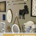 DIY wood arrow beside other wall decors with text overlay that says diy arrow nursery decor
