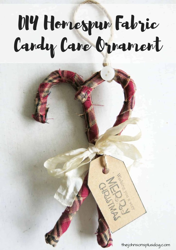 How to make homemade fabric ornaments - two plaid-wrapped candy canes tied together with ribbon to create a homemade fabric ornament.