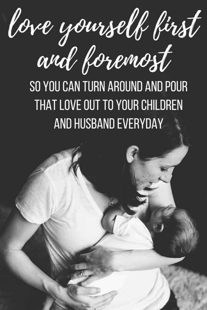 Black and white image of mother holding newborn baby with text overlay that says 