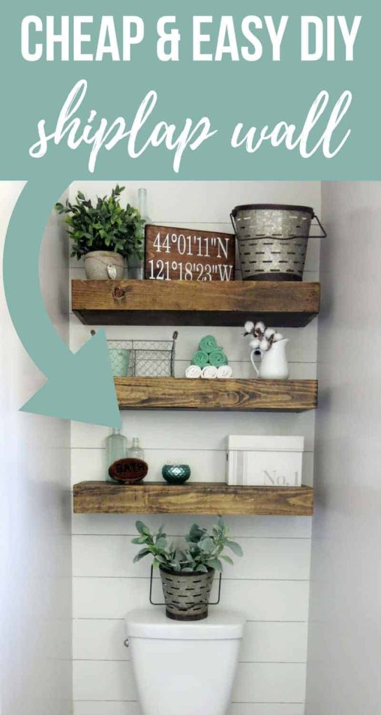 Farmhouse bathroom with wooden shelves decorated with text overlay that says cheap and easy DIY shiplap wall