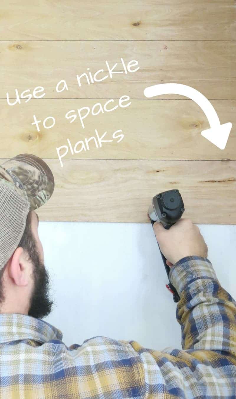 When installing your faux shiplap planks, use a nickel to evenly space the planks to give them the classic shiplap look.