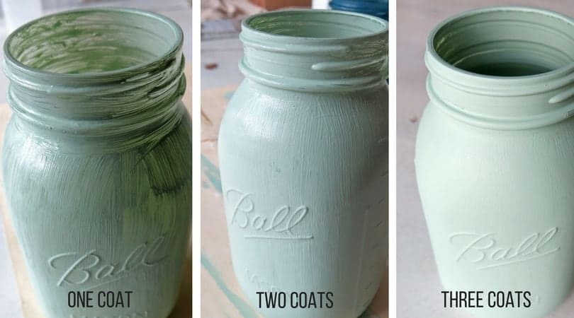 Three photos showing what a mason jar looks showing the progression of three coats of acrylic craft paint