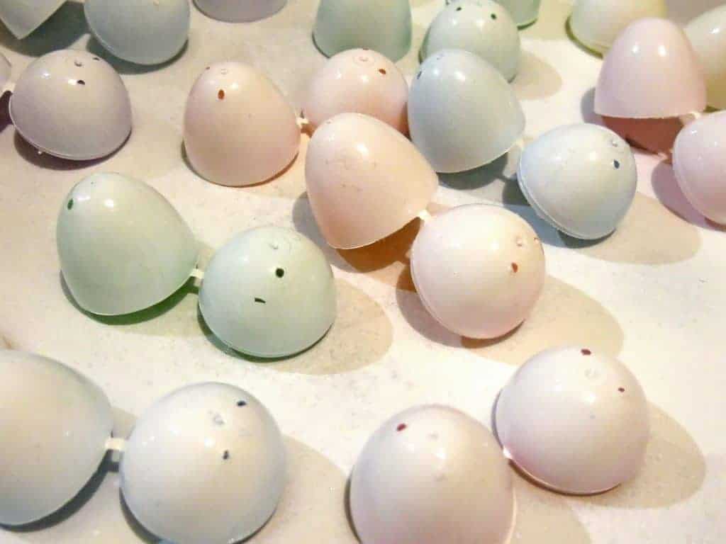 Prep the plastic Easter eggs with white spray paint