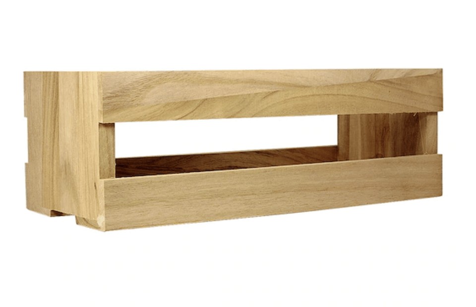 An unfinished wooden crate against a white background. With just a few simple steps, this unfinished crafting crate will be transformed into a stylish farmhouse centerpiece.