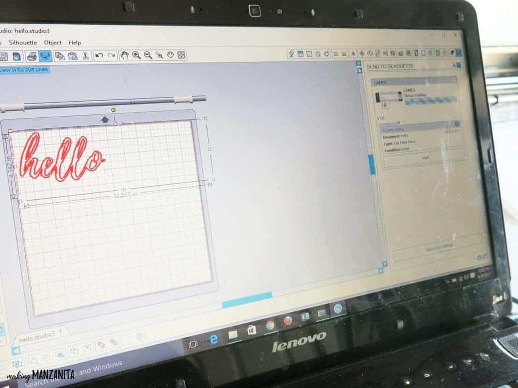 A laptop screen showing Silhouette Studio software, in the process of designing a stencil for our hello sunshine wood sign.