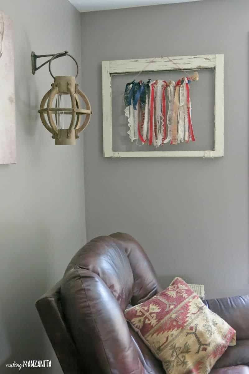 I added this American flag window hanging to an empty vintage window frame for some patriotic 4th of July decor