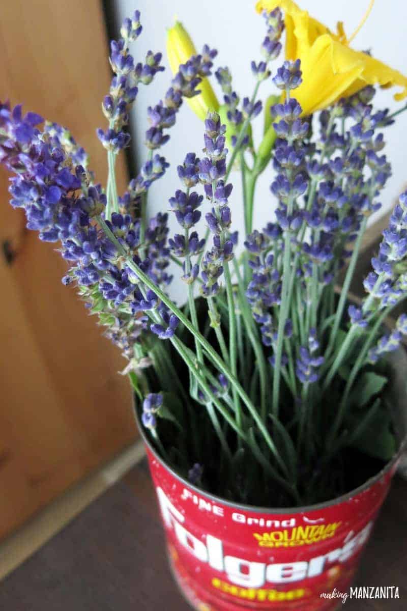 Get creative with your DIY coffee station decorations. We used an old metal Folgers coffee can with lavender and yellow flowers