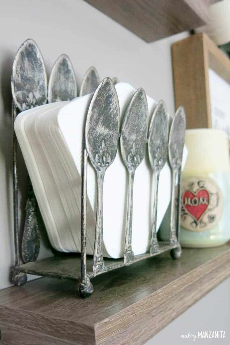 Need a good solution for storage coffee filters in your DIY coffee station? Stack them up in a vintage metal napkin holder on a wood shelf