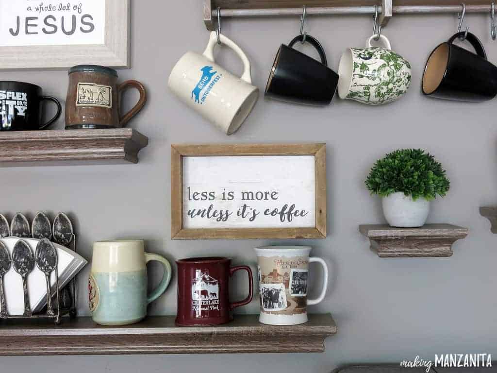 Take advantage of wall space above your coffee station with floating shelves and wood coffee mug hanger with mugs