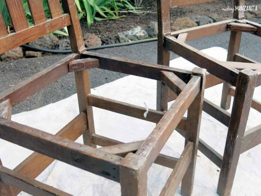 A closer look at the two solid wood chair frames before upcycling into a back yard bench. We've removed the seat cushions from the chair.