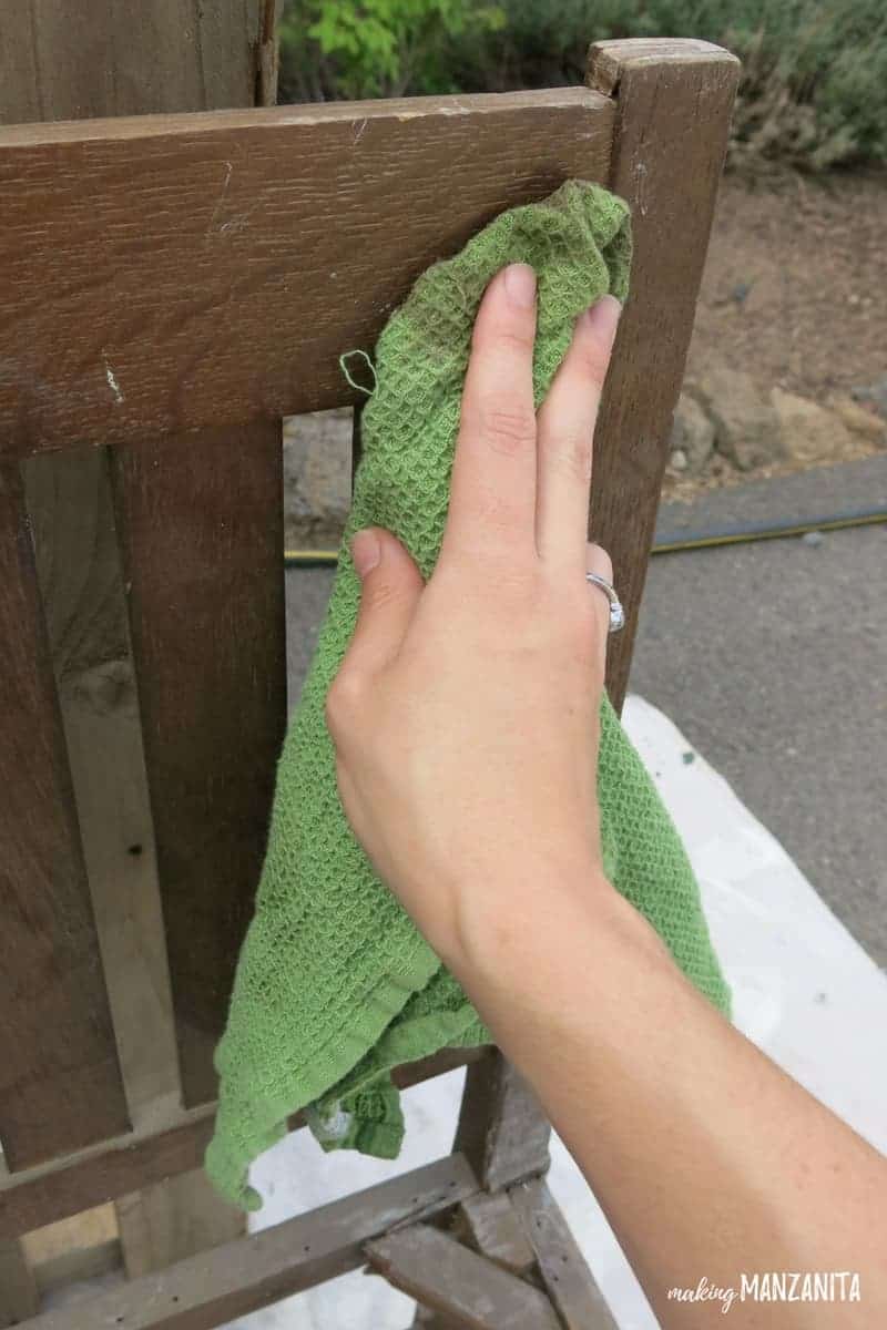 Use an old cloth or rag to thoroughly clean the wood chairs.