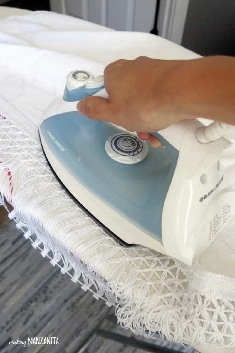Run an iron over the fabric trim to ensure the adhesive tape is fully fused to the fabric.