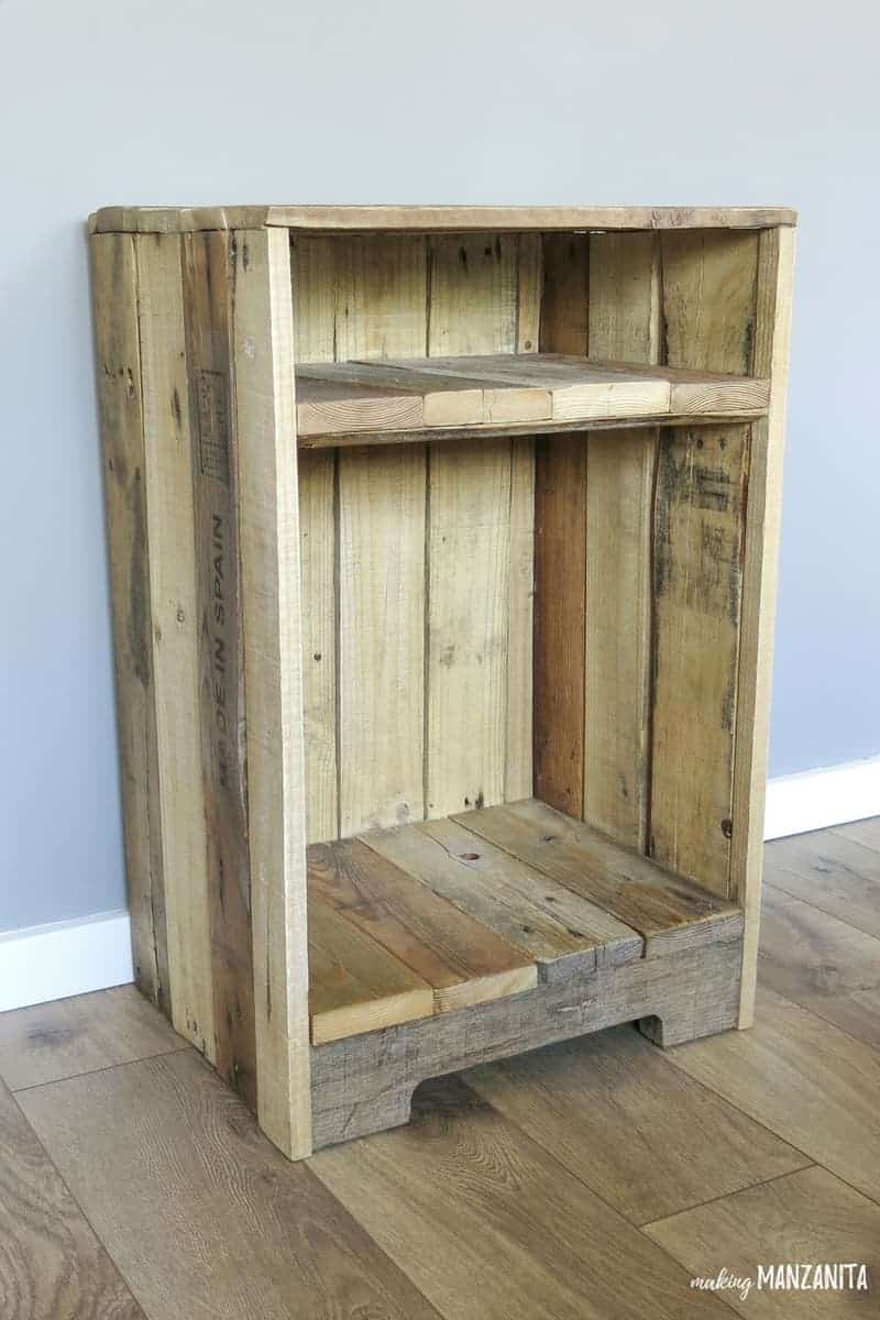 A full look at the completed rustic pallet wood side table made from upcycled pallets.