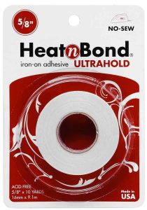 Heat n Bond iron-on adhesive is a great tool to help lengthen a shower curtain that's too short in a pinch.