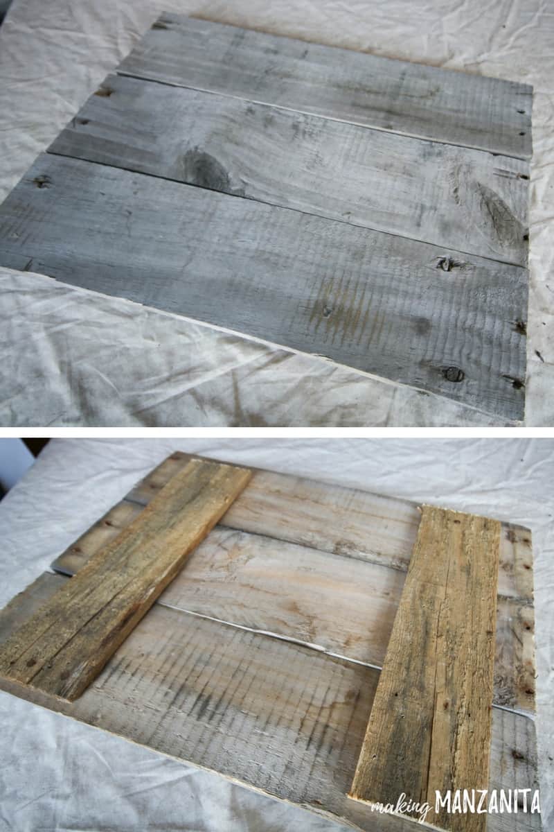 three pieces of pallet wood cut into a square and attached using two support pieces in back. Image shows front of wood - an aged grey color - and the back of the wooden sign.