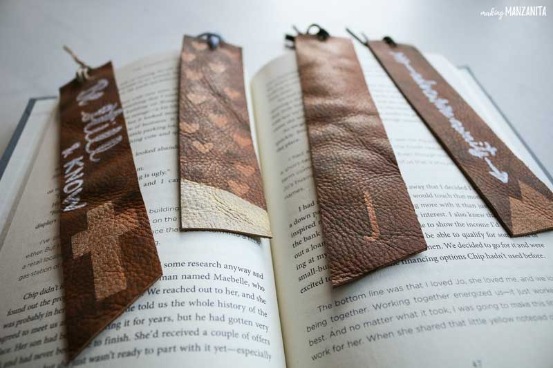 diy leather bookmarks made with dark wax stain and different sticker decor