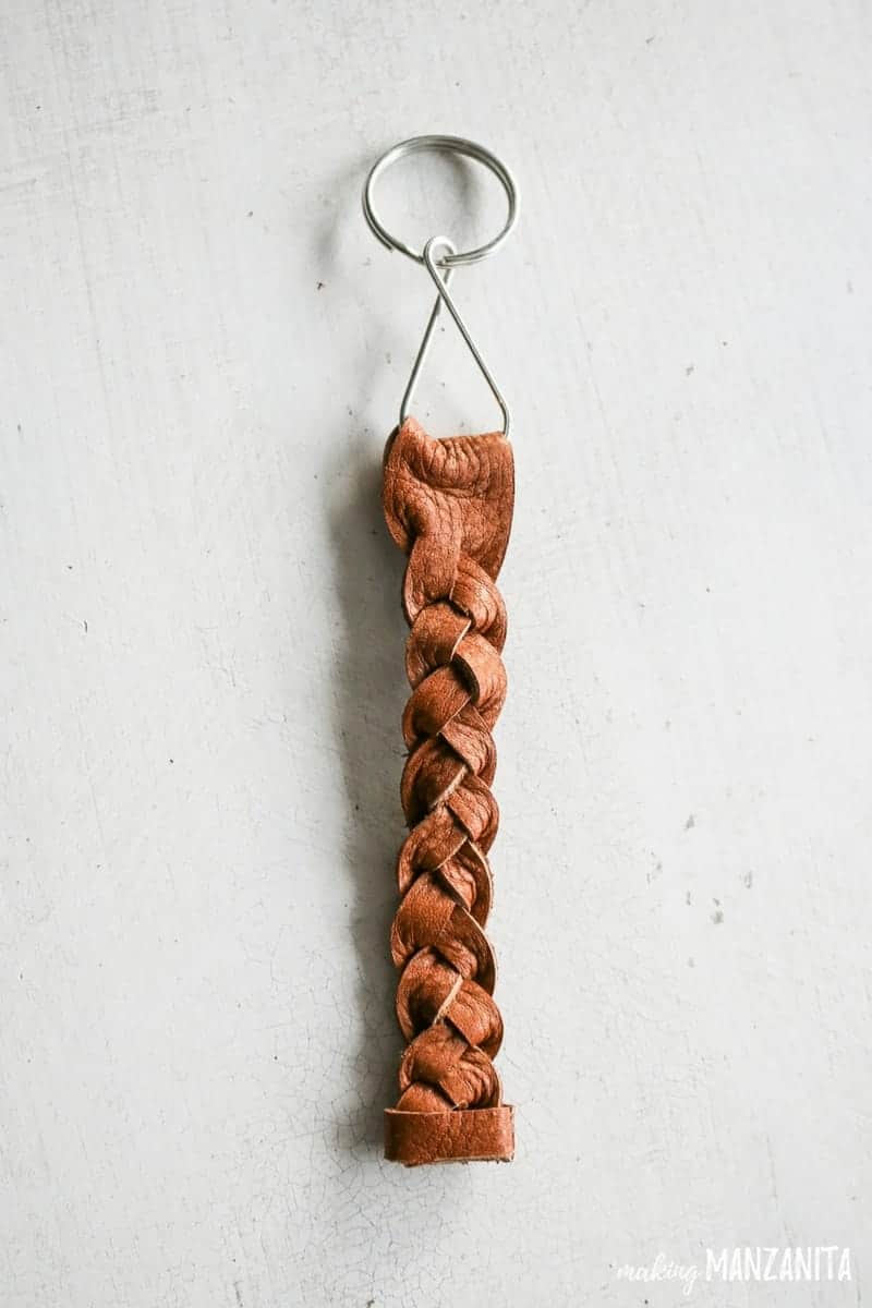A finished DIY braided leather keychain