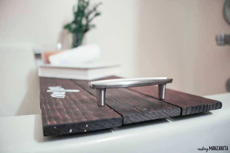 Close up shot of handles on bath tray