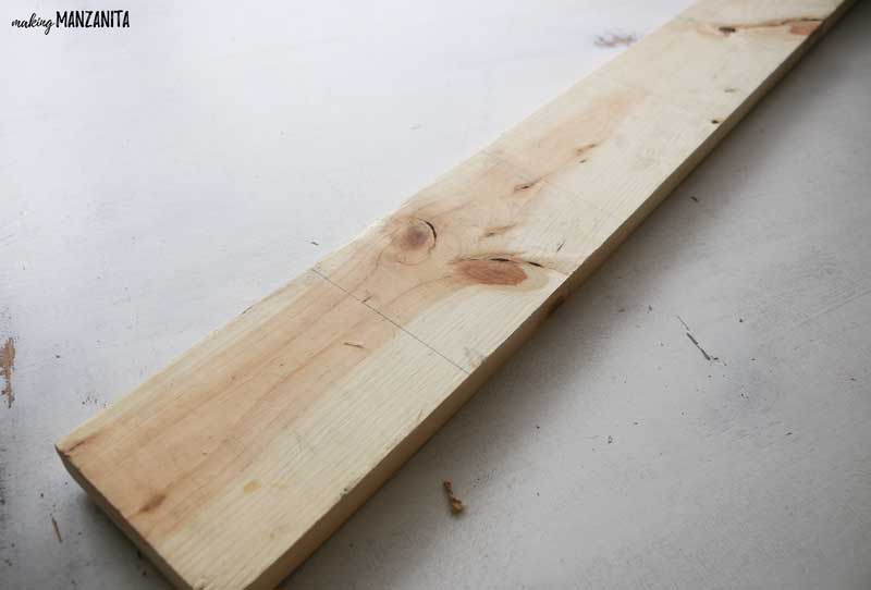 This wood plank will be cut into pieces to make a BELIEVE Christmas sign