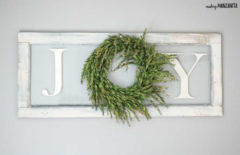 This farmhouse style Joy Christmas sign is SO easy to make with just a few supplies and 3 easy steps!