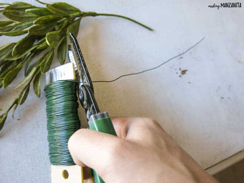 Use a wire cutters to cut pieces of floral wire for your farmhouse wreath