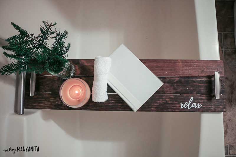 a diy wooden bathtub tray is a thoughtful mother's day present to make for mom's relaxation days