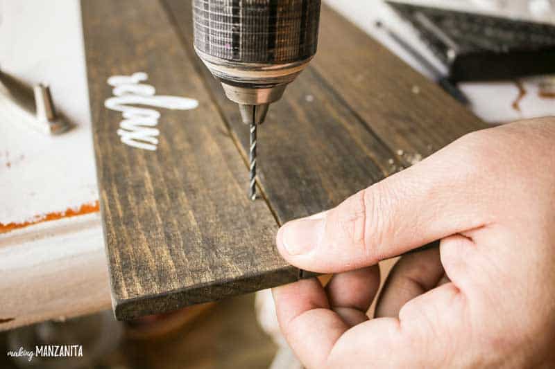 Drilling holes to add handles on this Modern Farmhouse Bath Tub Tray
