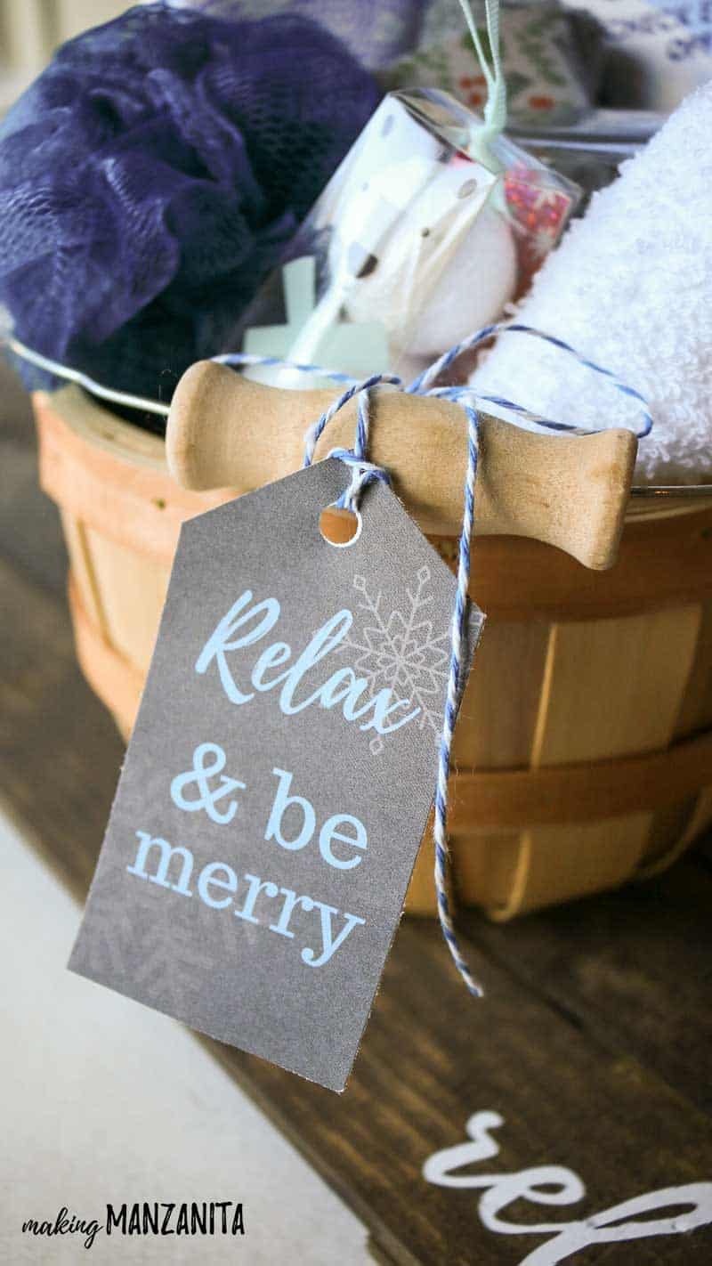 Close up of gift tag tied to the relaxation gift basket that says relax and be merry