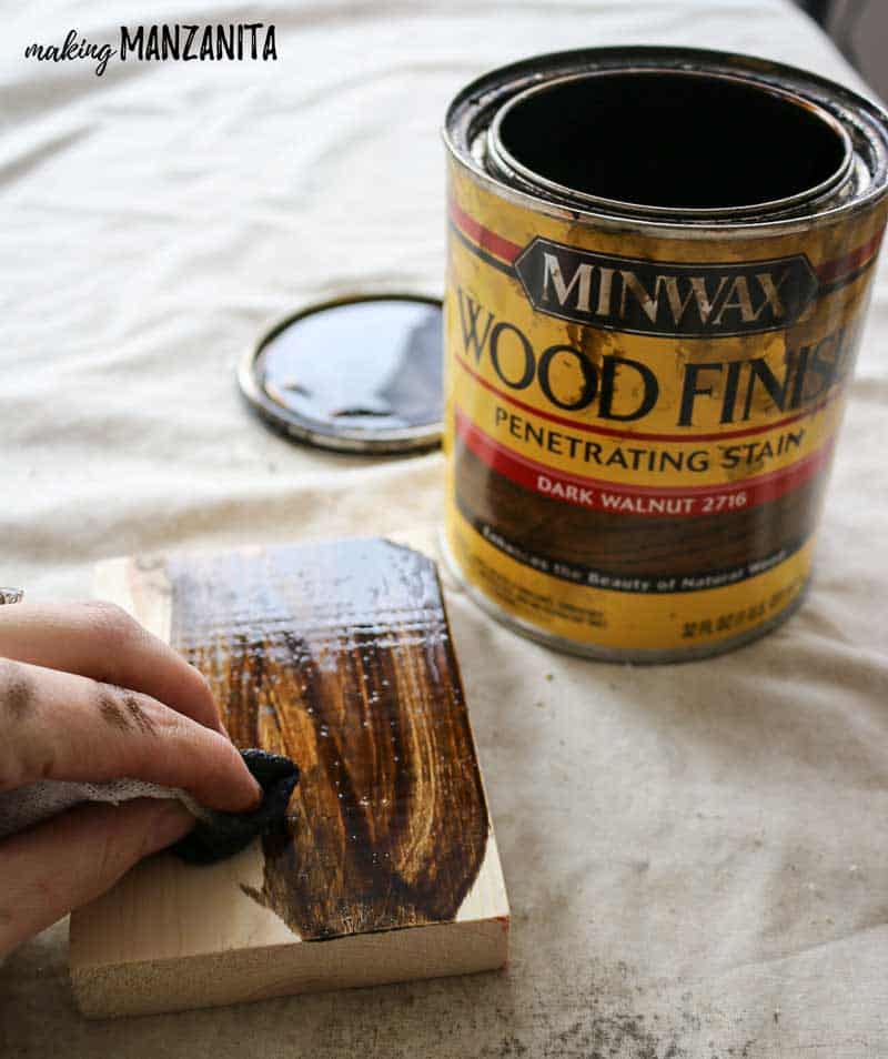 Using Dark Walnut wood stain to stain the wooden blocks