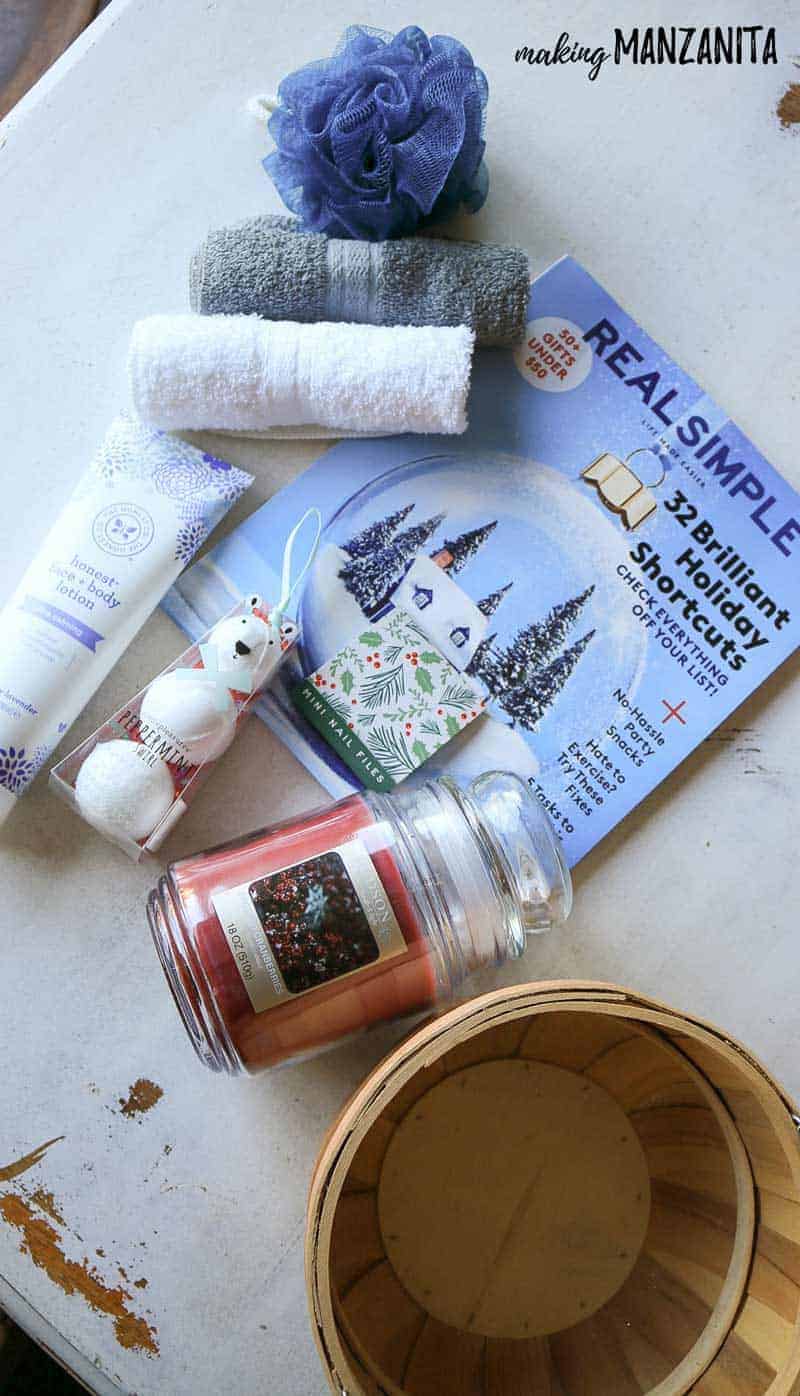 Magazine, lotion, candle, bath bombs, loofah, nail files, Rolled up wash cloths for the relaxation bath gift basket ideas