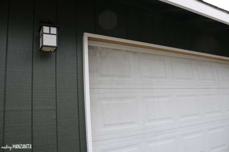 Before we painted the garage door, it was dirty and grimy, even after pressure washing.