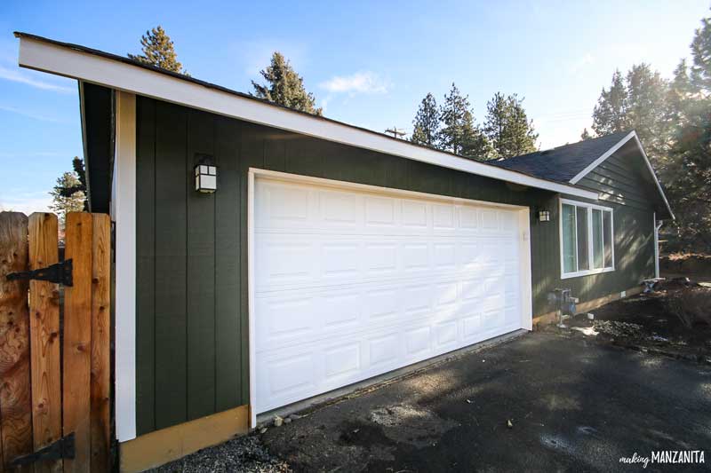 After painting our home exterior - our garage door and dark green home exterior with white trim.