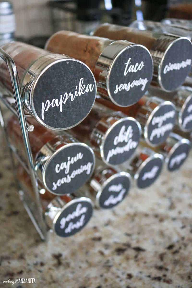 These FREE printable spice jar labels are the KEY to smart spice rack and spice cabinet organization! Label your spice jars with these clear and simple black and white spice jar stickers.