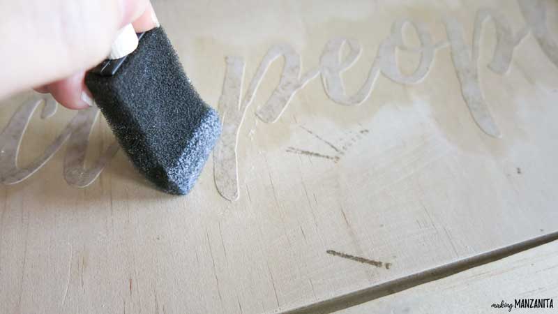 The stencil with words were sealed with mod podge to seal the stencil and prevent the paint from bleeding underneath