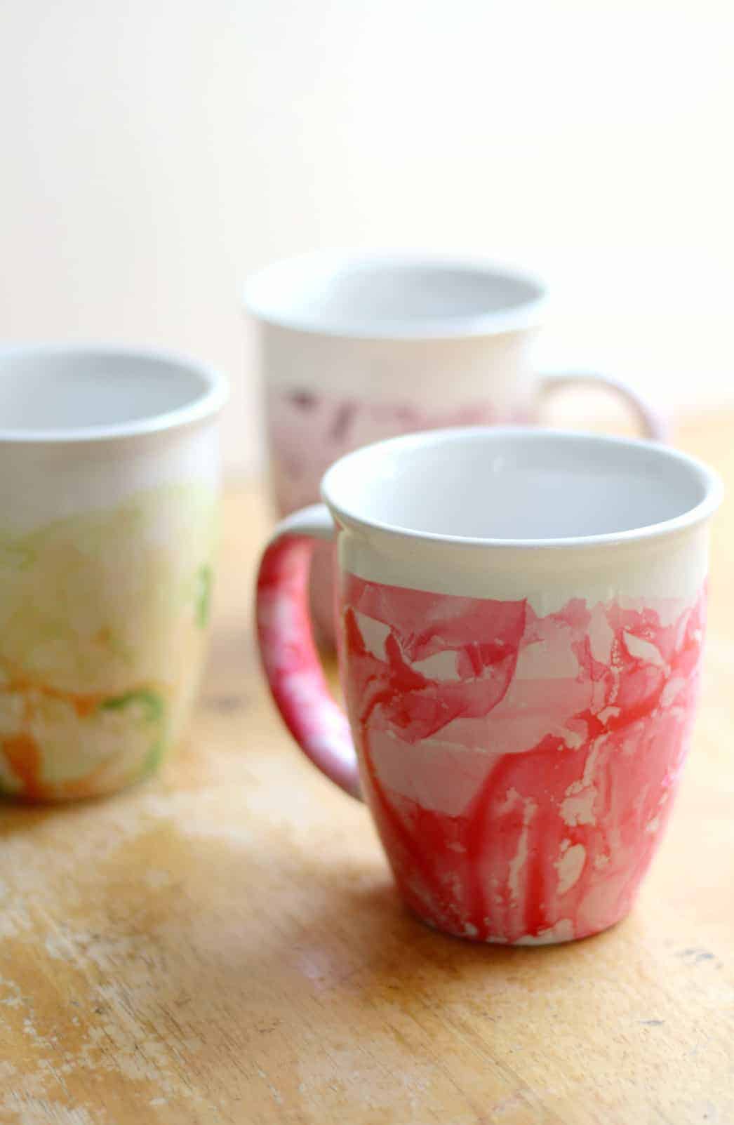 a homemade marbled nail polish mug is an easy diy mother's day gift your mom will cherish