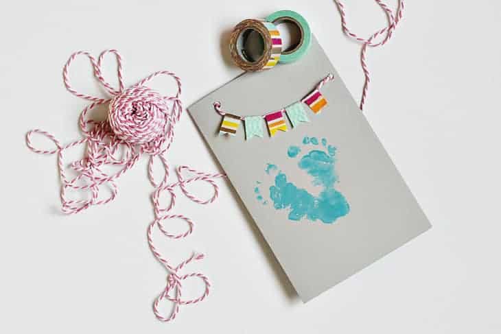 a homemade baby footprint mother's day card is a thoughtful mother's day present for new moms