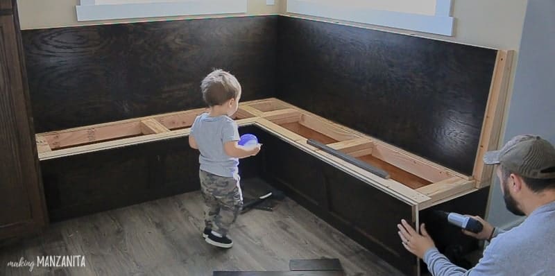 Installing side panel on corner bench in kitchen