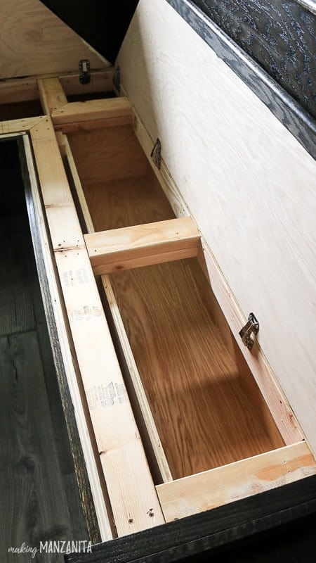 Bench seating in kitchen with seat that lifts up to provide extra storage