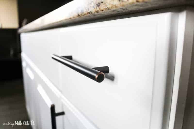 Gorgeous new kitchen cabinet drawer pulls installed on our white kitchen drawers