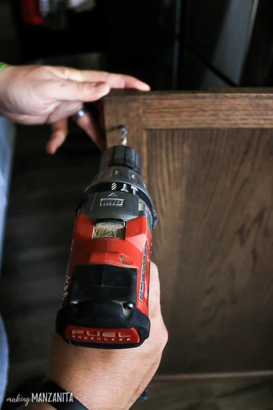 Drilling holes in corner of kitchen cabinet to install hardware