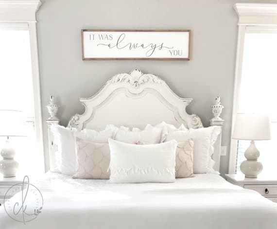 It was always you farmhouse sign above headboard in bedroom