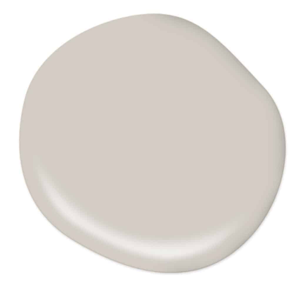 A paint-drop sample of Burnished Clay - a taupe paint color.